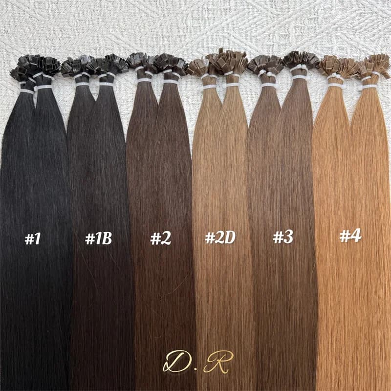Solid-color DR K-tip bundles arranged from dark to light with shade references visible
